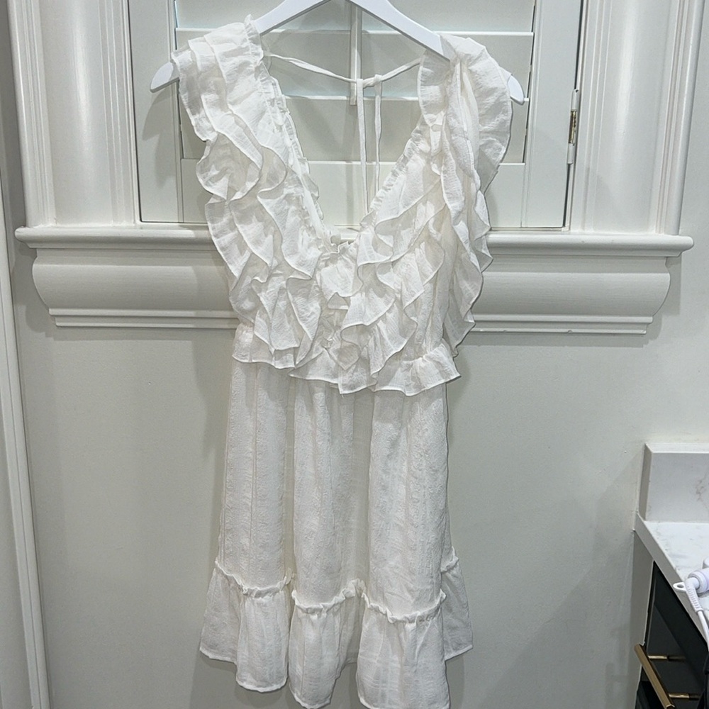 Storia white ruffle dress